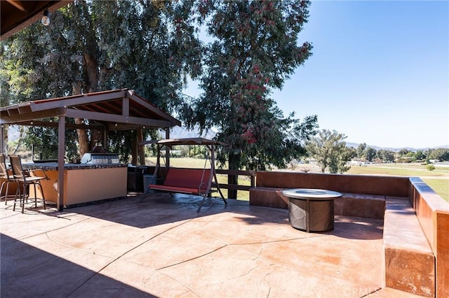 view of patio / terrace with outdoor dry bar