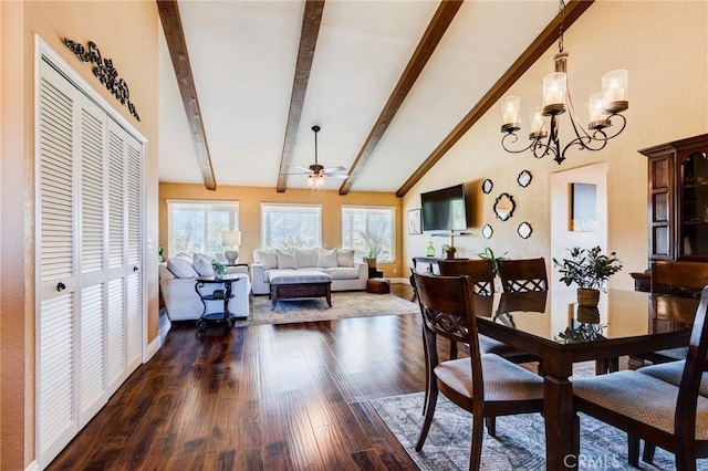 dining area with dark wood finished floors, lofted ceiling with beams, baseboards, and ceiling fan with notable chandelier