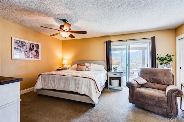 bedroom featuring ceiling fan, access to outside, a textured ceiling, and carpet flooring