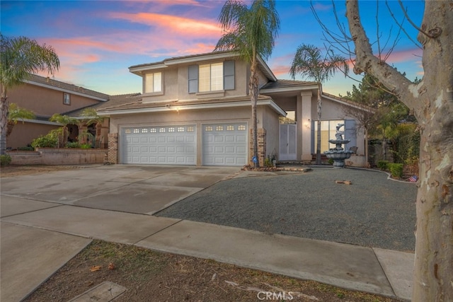 view of front of property featuring a garage