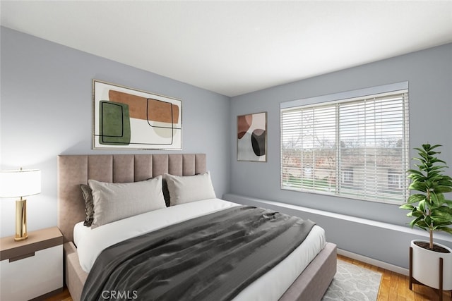 bedroom featuring light wood-type flooring