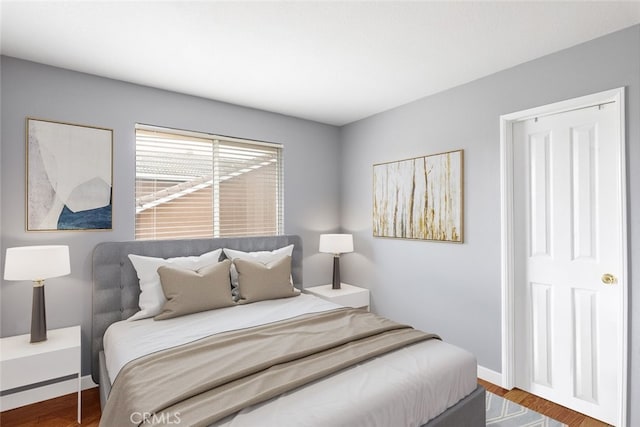 bedroom featuring hardwood / wood-style flooring