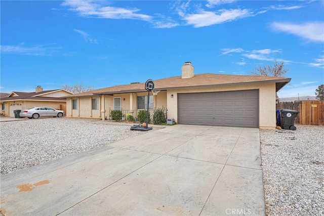 ranch-style house featuring a garage