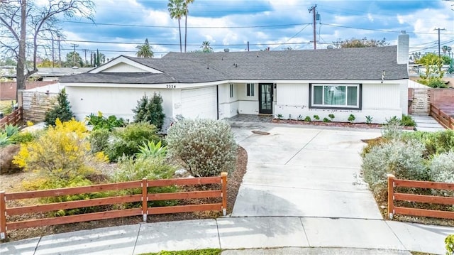 single story home featuring a garage