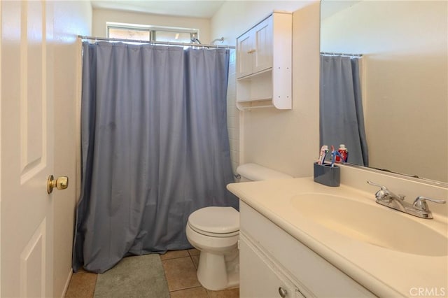 bathroom with tile patterned floors, toilet, a shower with shower curtain, and vanity