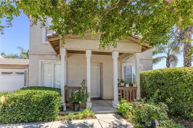 property entrance with a garage