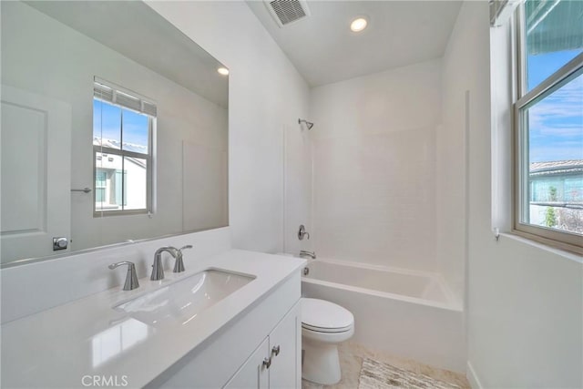 full bathroom with toilet, vanity, and bathtub / shower combination