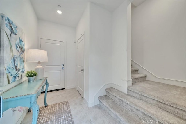 interior space with light tile patterned floors