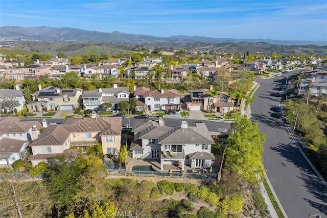 birds eye view of property featuring a residential view and a mountain view