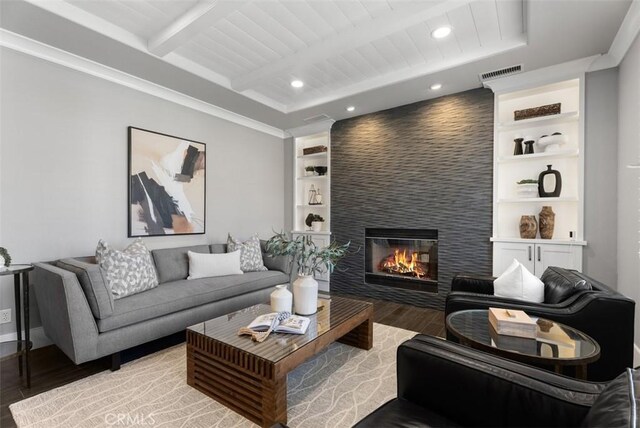 living room with visible vents, built in shelves, beamed ceiling, wood finished floors, and recessed lighting