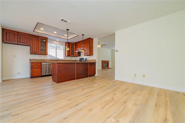 kitchen with sink, light hardwood / wood-style flooring, pendant lighting, ceiling fan, and stainless steel appliances