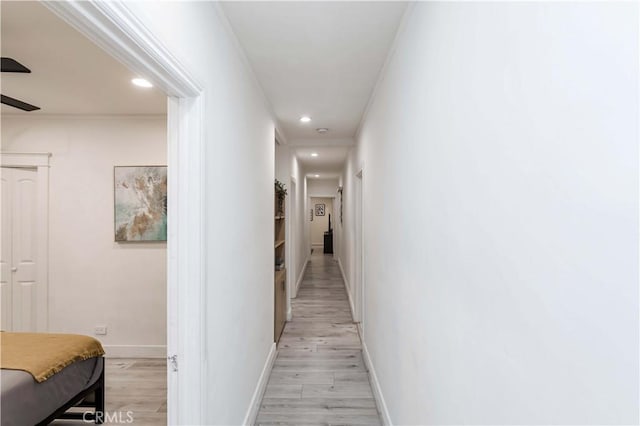 hallway featuring light hardwood / wood-style flooring