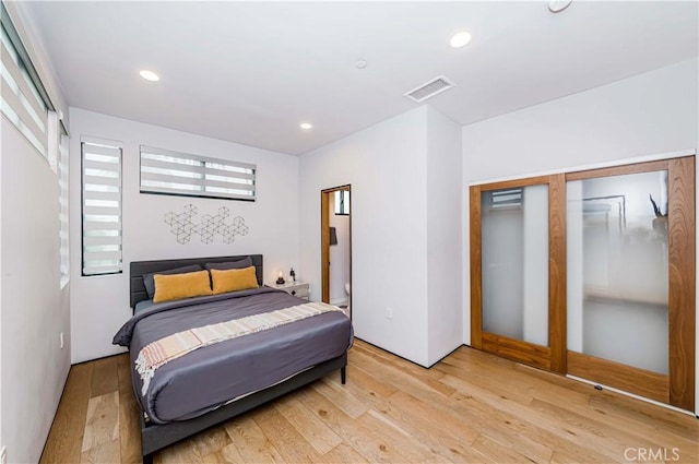 bedroom featuring light hardwood / wood-style flooring