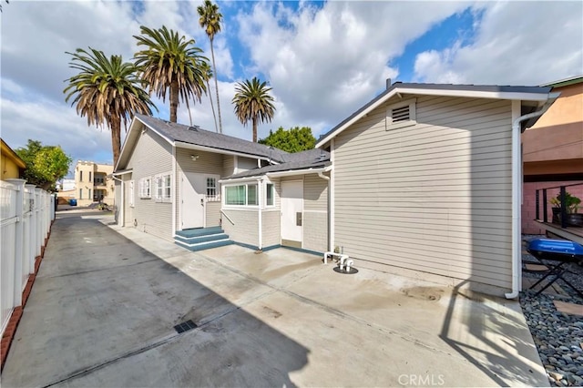 rear view of house with a patio area