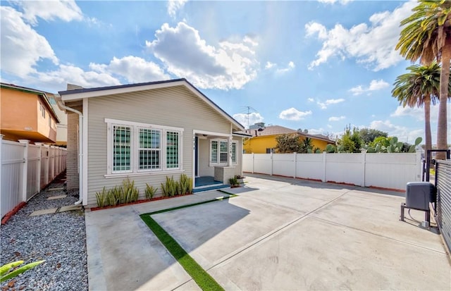 rear view of property with a patio