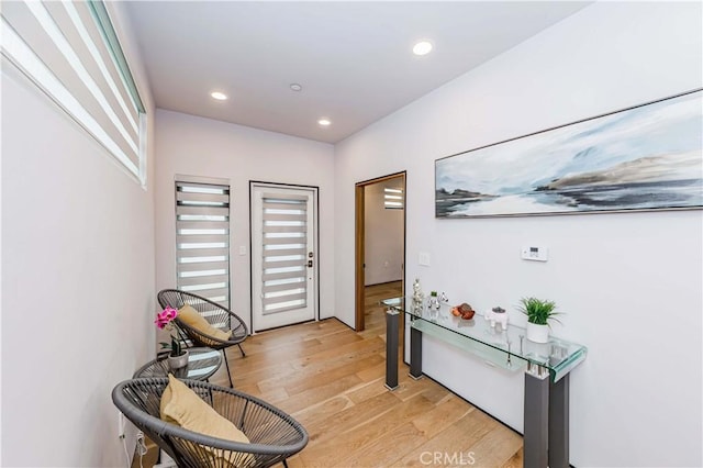 doorway to outside with light hardwood / wood-style flooring