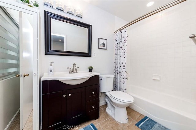 full bathroom featuring tile patterned flooring, vanity, shower / tub combo, and toilet