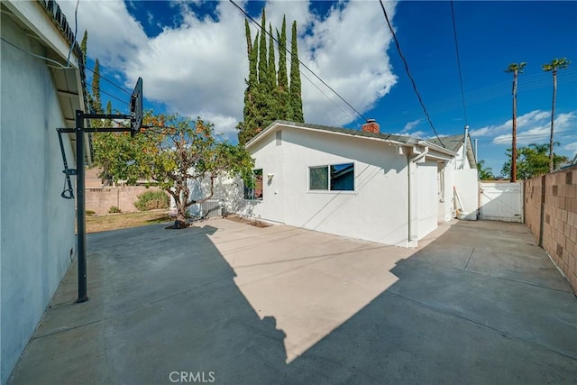 exterior space with a patio area