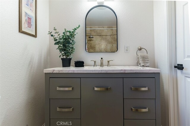 full bathroom featuring vanity