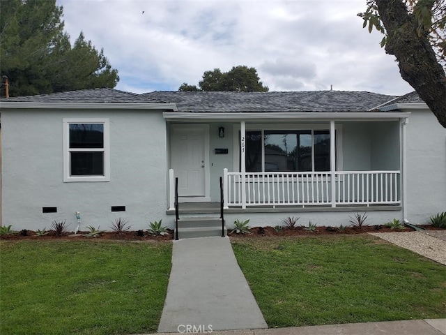 view of front of house featuring a front yard and a porch