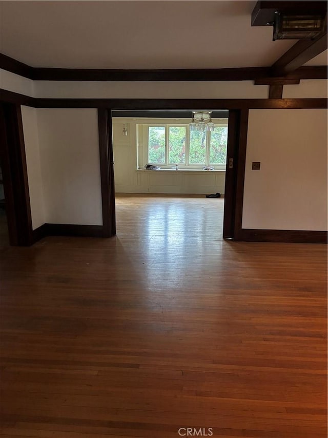 empty room featuring hardwood / wood-style flooring