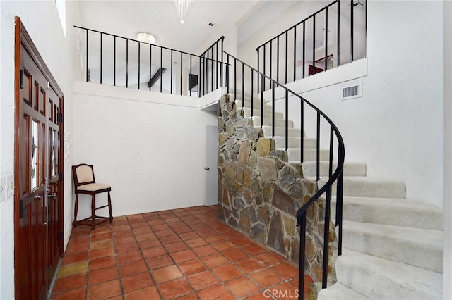 stairs with a towering ceiling