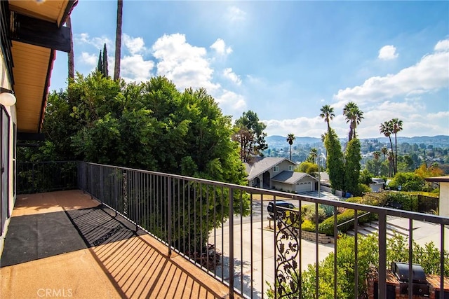 balcony featuring a mountain view