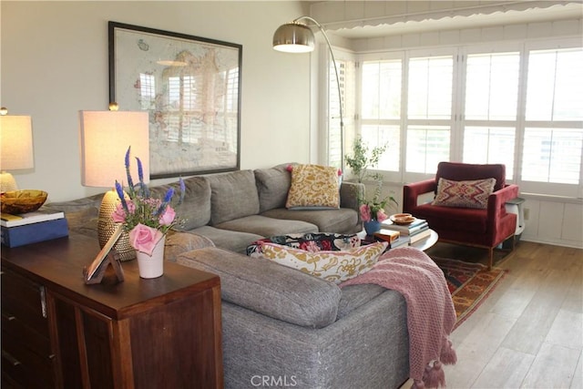 living room with light hardwood / wood-style flooring