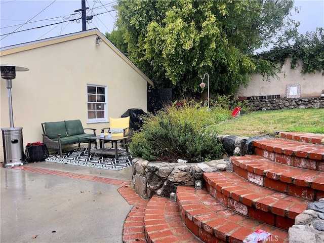 view of patio featuring an outdoor hangout area