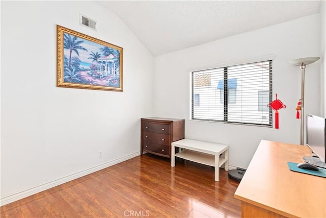 office area featuring lofted ceiling and hardwood / wood-style floors