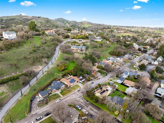 drone / aerial view featuring a mountain view