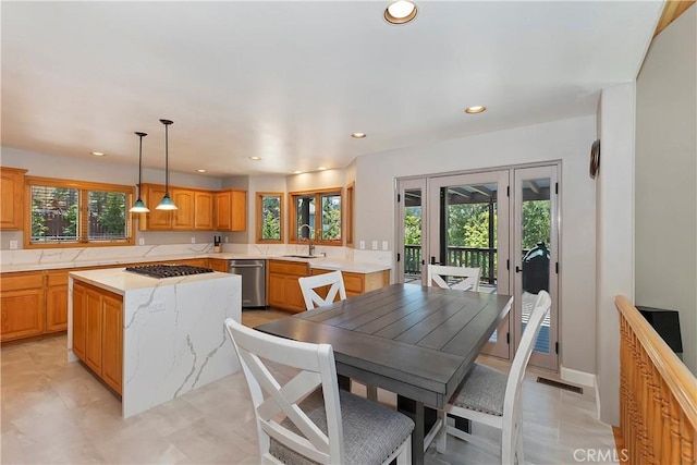 dining space featuring sink