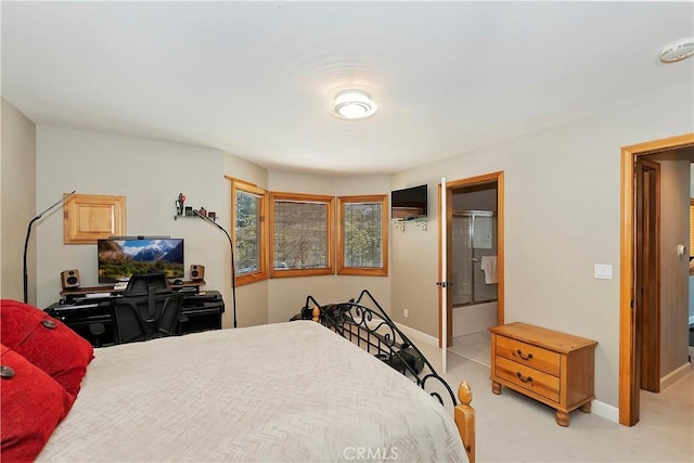 bedroom featuring light colored carpet