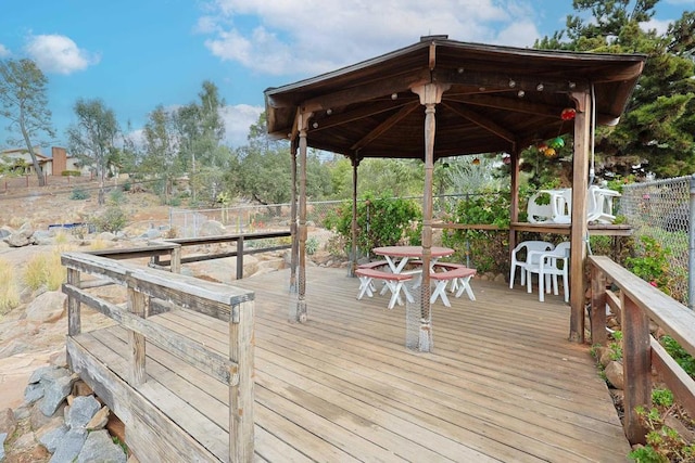 wooden deck featuring a gazebo