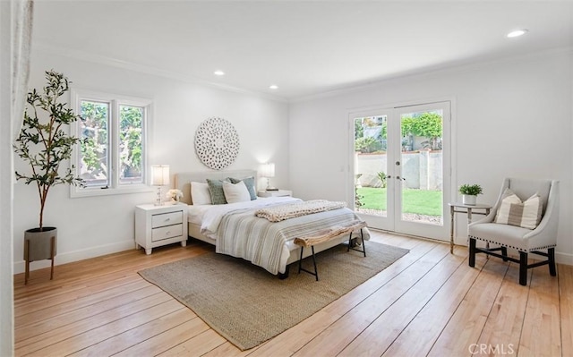 bedroom featuring french doors, ornamental molding, access to exterior, and light wood-type flooring