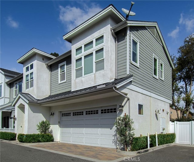 view of front of house with a garage