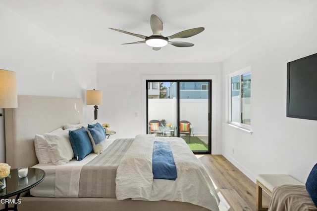 bedroom featuring ceiling fan, baseboards, light wood-style flooring, and access to exterior