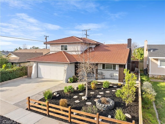 view of front of house featuring a garage and a porch