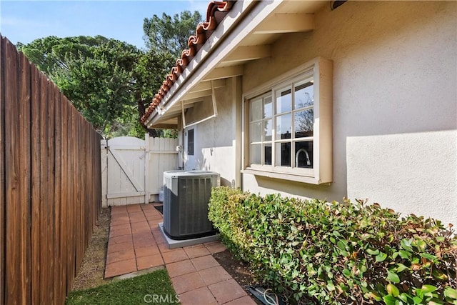 view of property exterior featuring central AC unit