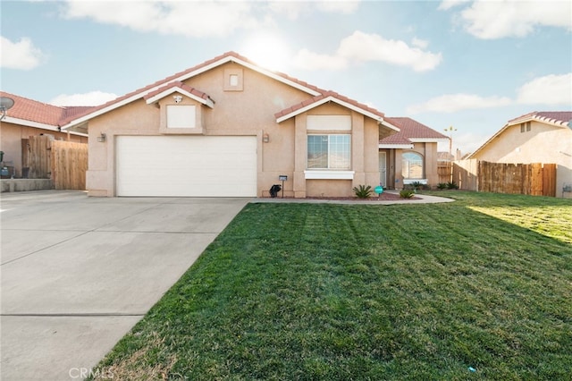 view of front of home with a front yard and a garage