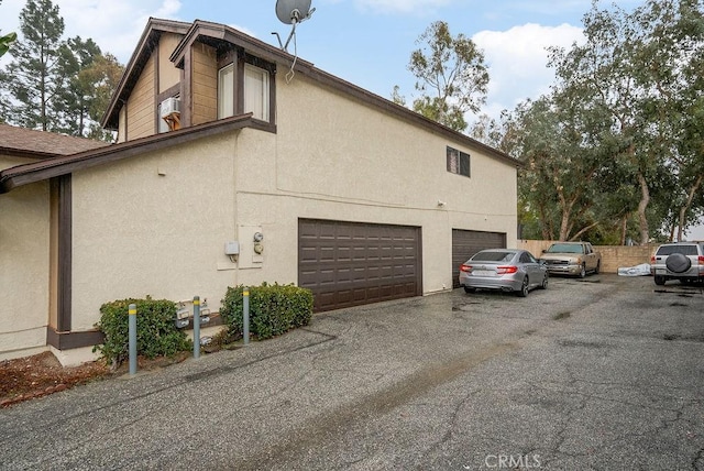 view of home's exterior with a garage