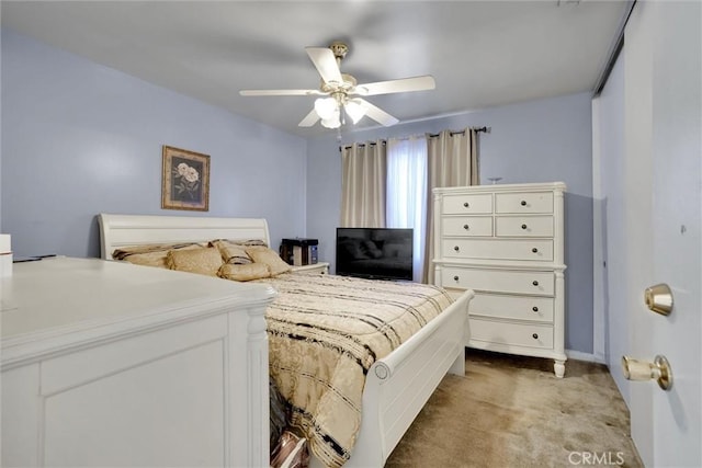 bedroom with light carpet and ceiling fan