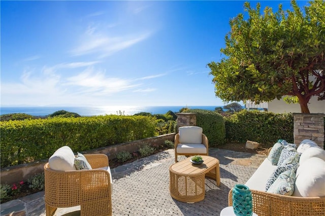 view of patio / terrace featuring a water view