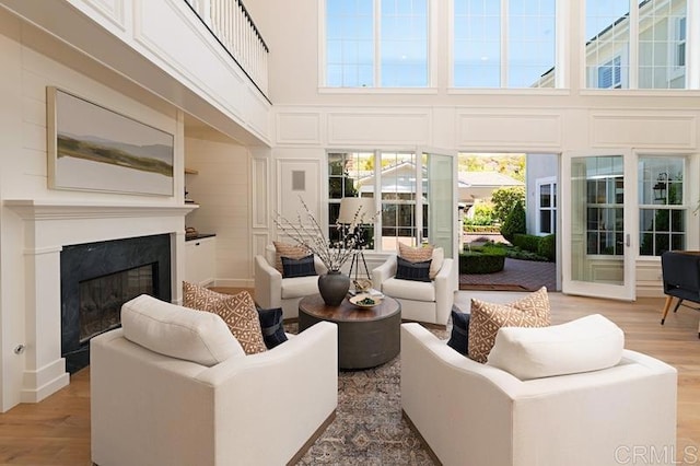 sunroom featuring a premium fireplace