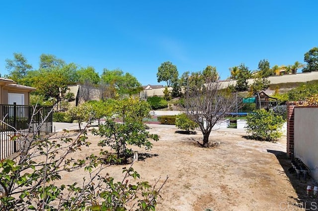 view of yard featuring fence