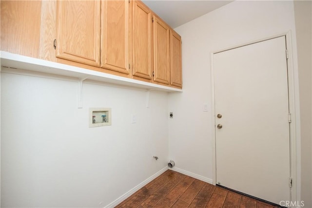 laundry room with washer hookup, electric dryer hookup, dark hardwood / wood-style floors, and cabinets