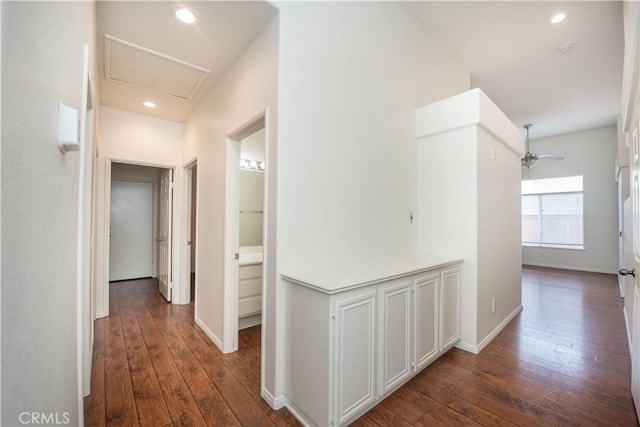 corridor featuring dark hardwood / wood-style floors