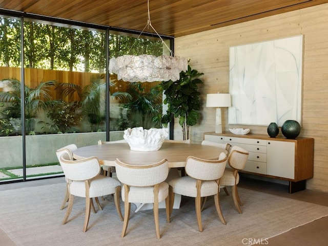 sunroom / solarium featuring wooden ceiling