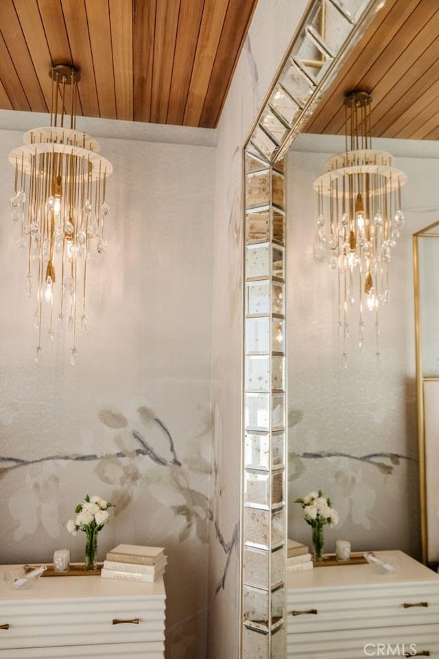bathroom with wooden ceiling and a notable chandelier