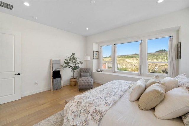 bedroom featuring light wood-type flooring